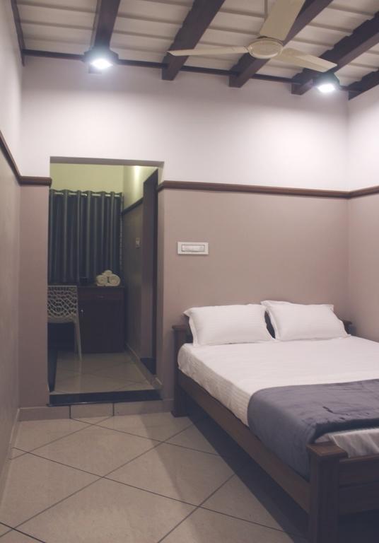 Icon Residency Hotel Kalpatta Phòng bức ảnh
